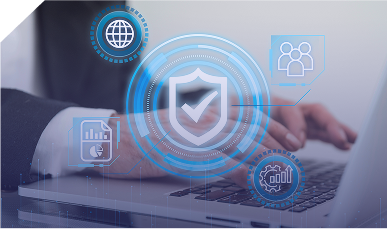 Professional using laptop with holographic security shield and data icons, representing secure ERP solutions from software development services in Pakistan.