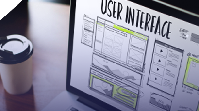 Laptop screen showing detailed hand-sketched UI/UX wireframes and user interface layouts for intuitive design in software development services in Pakistan.